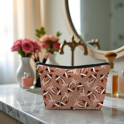 Coquette Pink Bow Football Makeup Bag, Football Lovers Gifts Cosmetic Bags for Women, Sports Player Fan Gifts Portable Travel Toiletry Bag Zipper Makeup Pouch